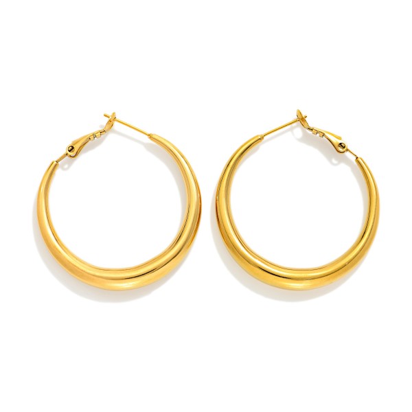 Tapered Metal Hoop Earrings 

- Stainless Steel 
- Approximately 1.25" D