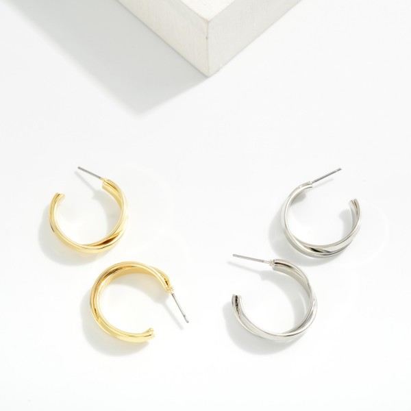 Layered Intertwined Metal Tone Hoop Drop Earrings 

- Approximately 1" D 