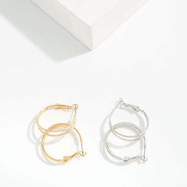 Layered Metal Tone Hoop Earrings 

- Approximately 1" D