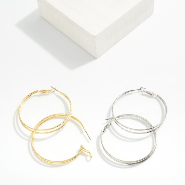 Layered Metal Tone Hoop Earring Drops 

- Approximately 1.75" D