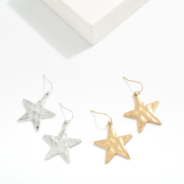 Metal Tone Hammered Star Drop Earring 

- Approximately 1.5" L 