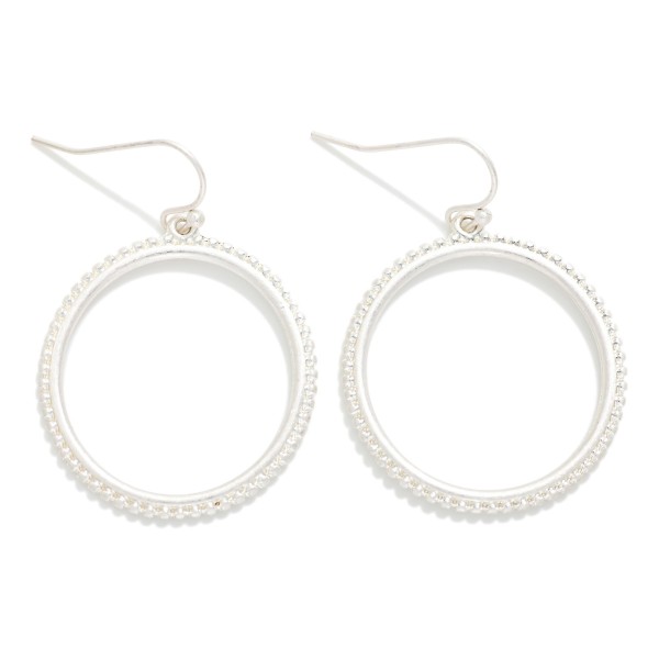 Flat Metal Hoop Earring With Studded Border 

- Approximately 1.5" D  