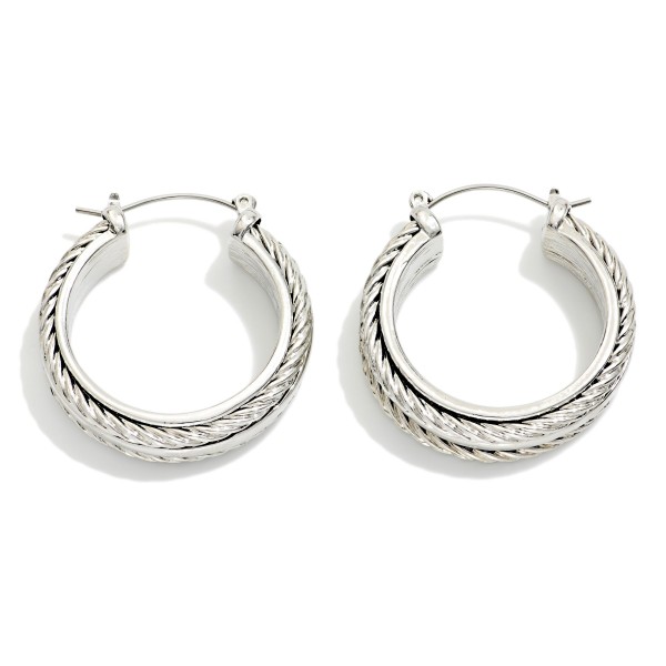 Metal Tone Hoop Earrings With Twisted Metal Details 

- Approximately 1" D