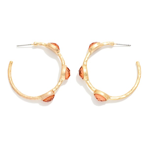 Metal Tone Hoop Drop Earring Featuring Glitter Acetate Oval Stations 

- Approximately 1.50" D 