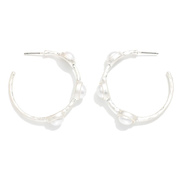 Metal Tone Hoop Drop Earring Featuring Glitter Acetate Oval Stations 

- Approximately 1.50" D 