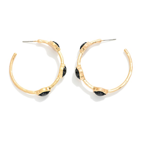 Metal Tone Hoop Earrings Featuring Glitter Acetate Clover Stations 

- Approximately 1.5" L 