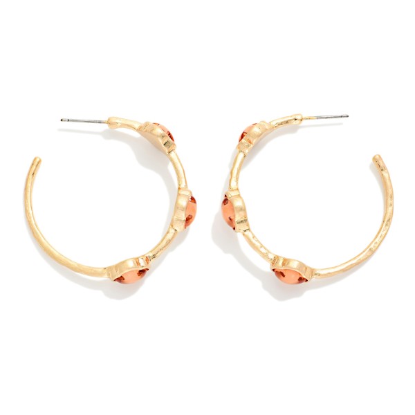 Metal Tone Hoop Earrings Featuring Glitter Acetate Clover Stations 

- Approximately 1.5" L 