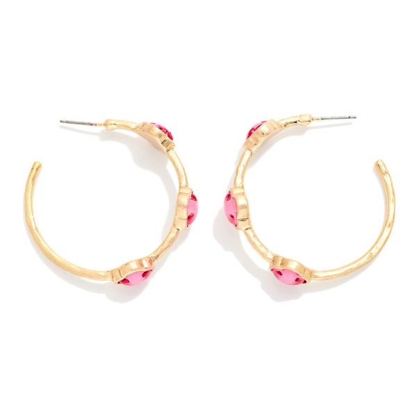Metal Tone Hoop Earrings Featuring Glitter Acetate Clover Stations 

- Approximately 1.5" L 