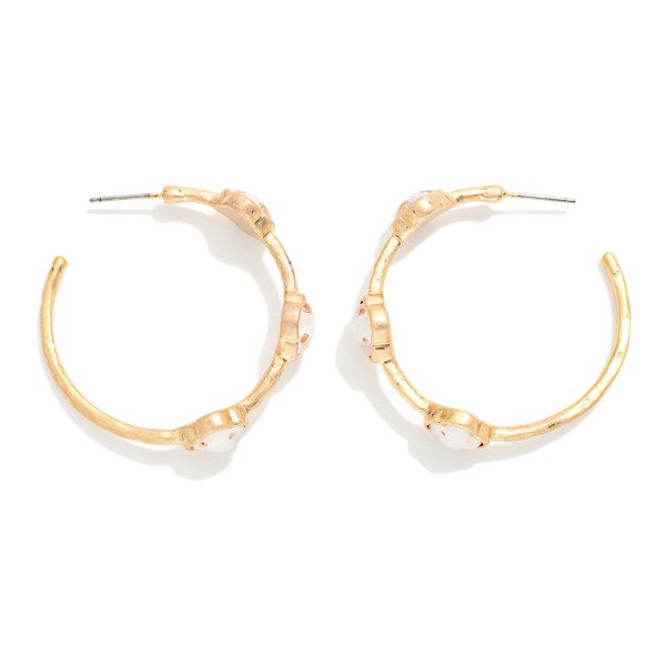 Metal Tone Hoop Earrings Featuring Glitter Acetate Clover Stations 

- Approximately 1.5" L 