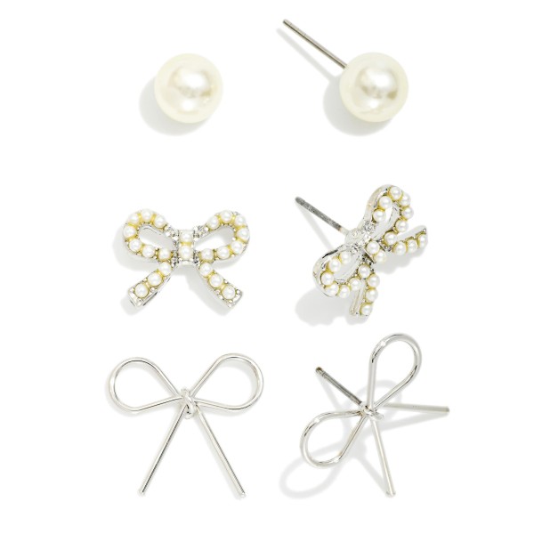 Set Of Three Metal Tone Earrings Featuring Bows & Pearls 

-Approximately .05-.75" L 