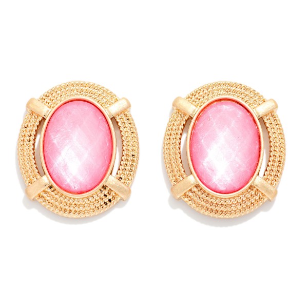 Oval Glass Crystal Stud Earring Featuring Gold Tone Metal Border 

- Approximately 1" L

