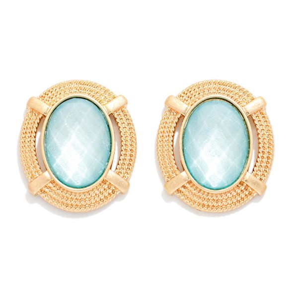 Oval Glass Crystal Stud Earring Featuring Gold Tone Metal Border 

- Approximately 1" L

