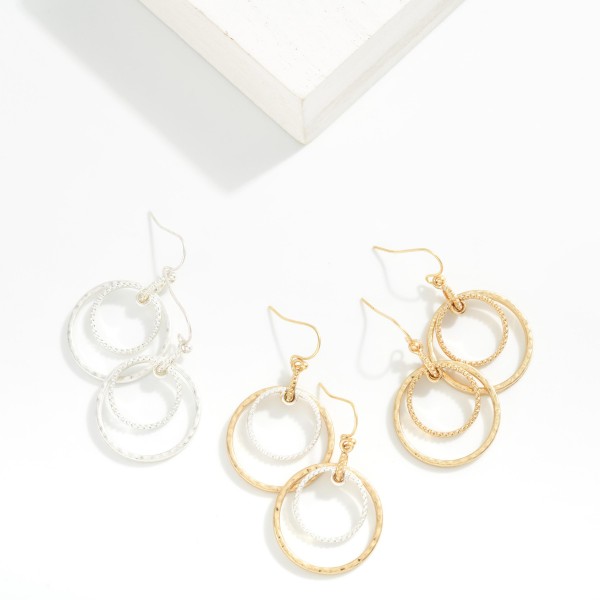 Ribbed & Hammered Metal Nesting Hoops Drop Earrings

- Approximately 1.5" L 