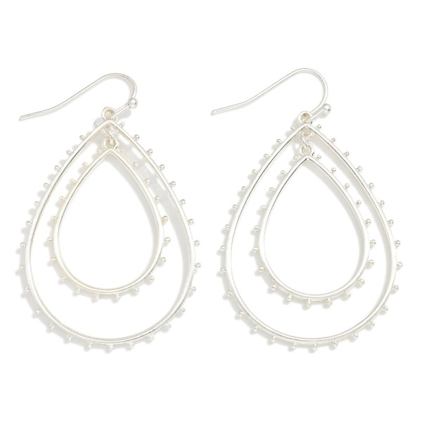 Metal Tone Nesting Teardrop With Studded Metal Ball Detail

- Approximately 2" L 