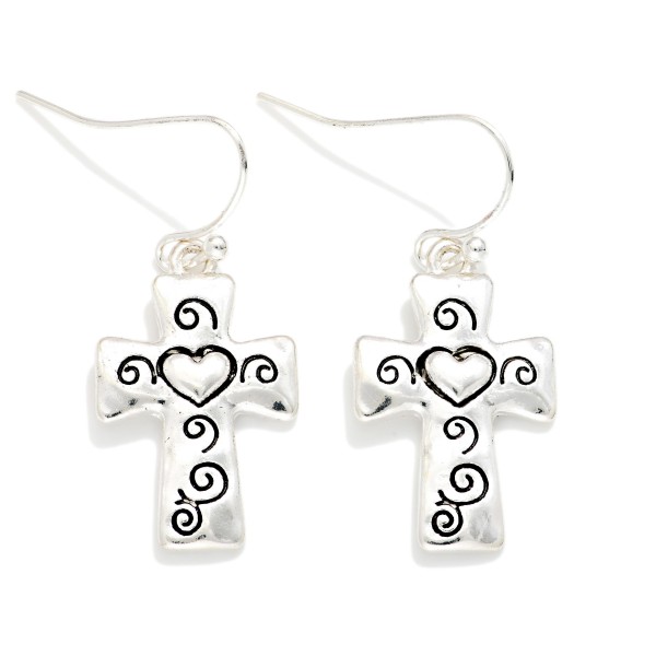 Metal Tone Cross Drop Earring Featuring Engraved Heart 

- Approximately 1" L 