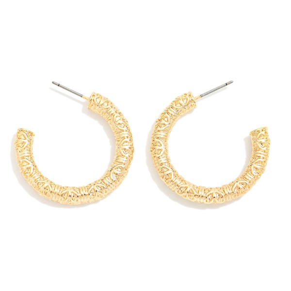 Textured Metal Tone Tube Hoop Earrings 

- Approximately .75" D