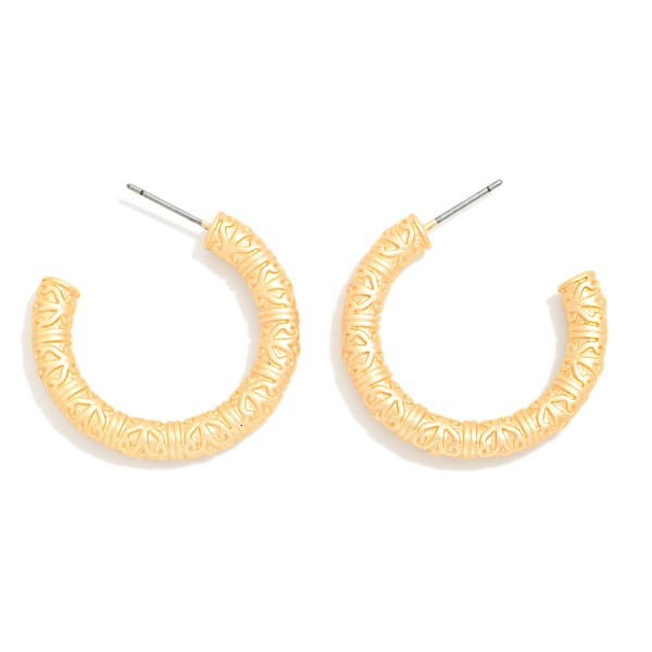 Textured Metal Tone Tube Hoop Earrings 

- Approximately .75" D