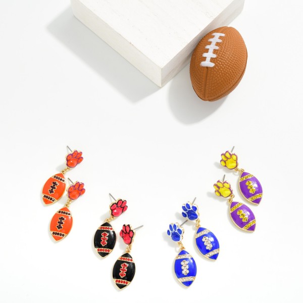 Enamel Paw Print & Football Post Drop Earrings Featuring Rhinestone Details 

- Approximately 1.5" L