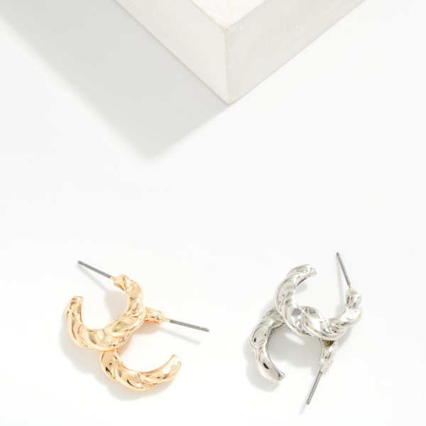 Twisted Metal Hoop Earrings 

- Approximately .5" D
