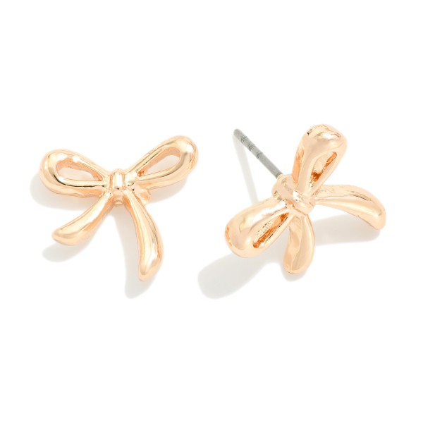 Metal Tone Bow Stud Earrings 

- Approximately .5" L