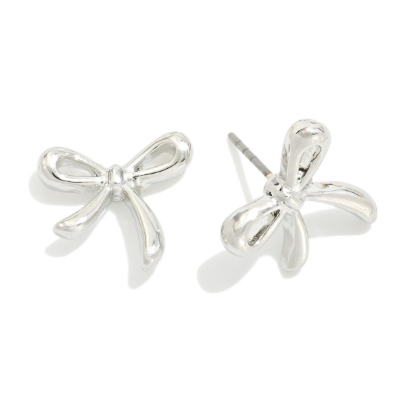 Metal Tone Bow Stud Earrings 

- Approximately .5" L