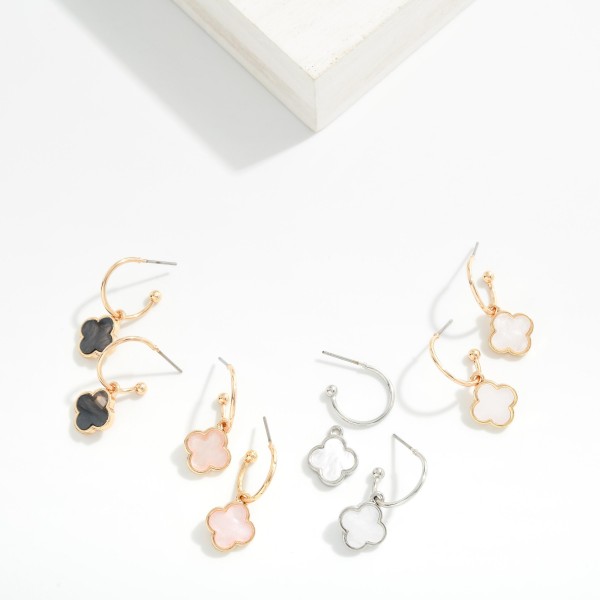 Metal Tone Drop Hoop Earrings Featuring Pearlescent Clover Accent 

- Approximately .75" L