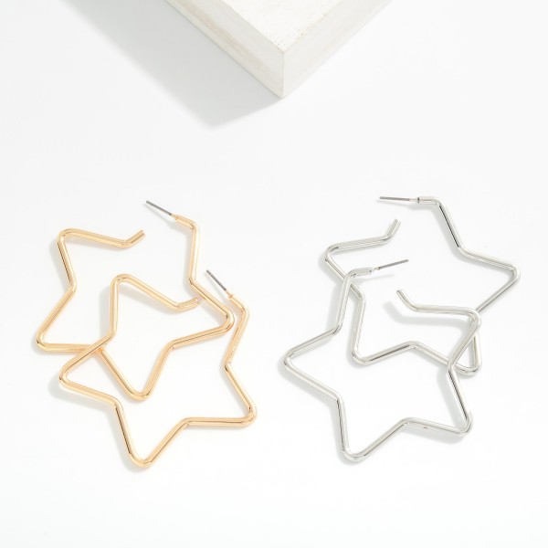 Large Metal Tone Star Hoop Earrings 

- Approximately 2" L