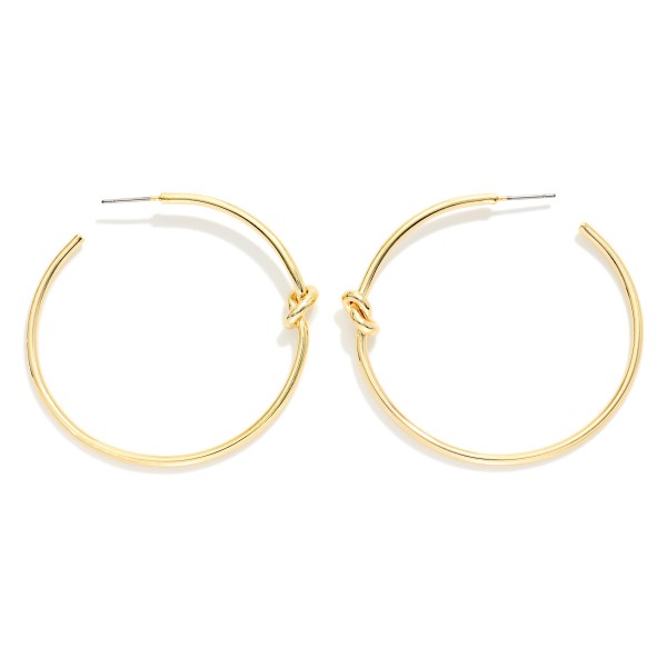 Metal Tone Knotted Hoop Earrings 

- Brass Plated 
- Approximately 2" D