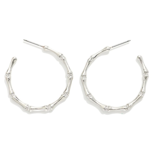 Metal Tone Bamboo Hoop Earrings 

- Approximately 1.25" D