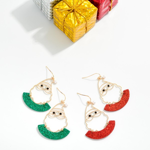 Metal Tone Wire Santa With Glitter Detail 

- Approximately 2" L