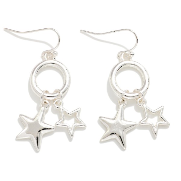 Metal Tone Drop Hoop Earrings Featuring Star Charms 

- Approximately 1.75" L