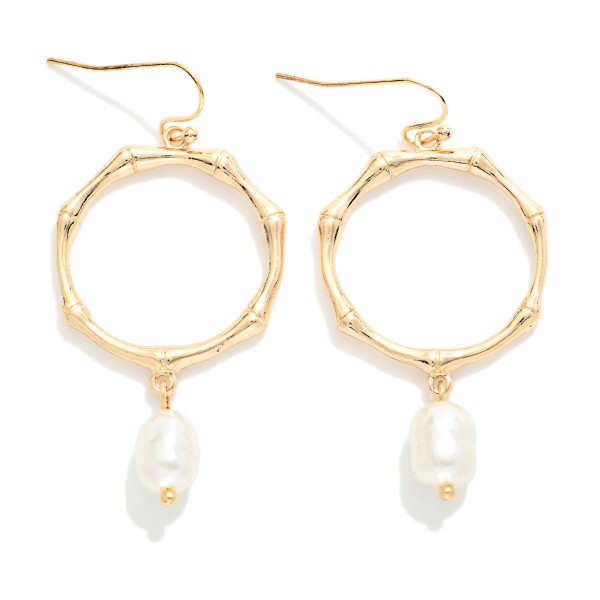 Metal Tone Bamboo Drop Hoop Earrings Featuring Rice Pearl Detail 

- Approximately 2" L