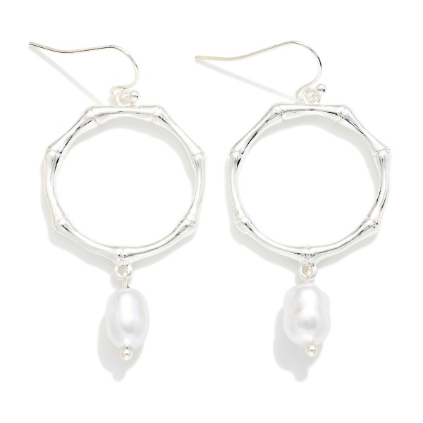 Metal Tone Bamboo Drop Hoop Earrings Featuring Rice Pearl Detail 

- Approximately 2" L