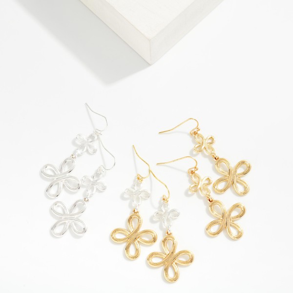 Linked Metal Tone Infinity Clovers Drop Earrings 

- Approximately 2" L