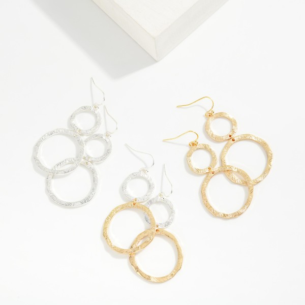 Linked Brushed Metal Circles Drop Earrings

- Approximately 2" L