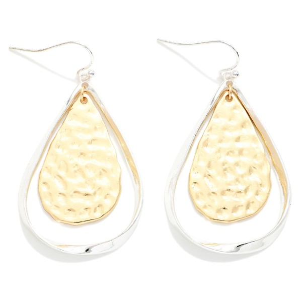 Hollow Flat Metal Teardrop With Hammered Metal Nesting Teardrop Drop Earrings 

- Approximately 2" L