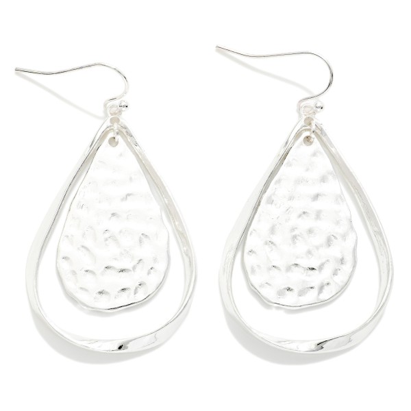 Hollow Flat Metal Teardrop With Hammered Metal Nesting Teardrop Drop Earrings 

- Approximately 2" L