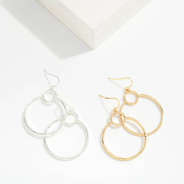 Double Hollow Metal Circles Drop Earrings 

- Approximately 2.25" L