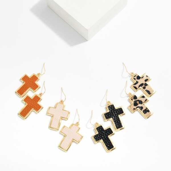 Metal Tone & Vegan Leather Cross Drop Earrings 

- Approximately 2" L