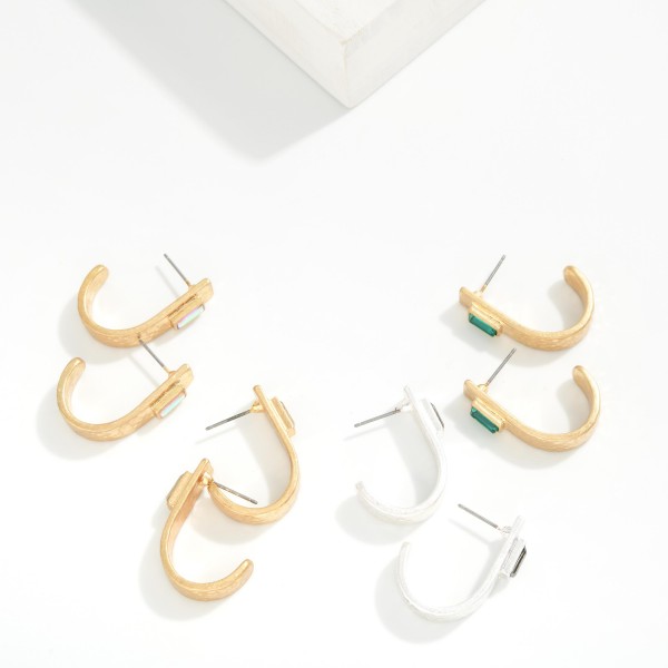 Hammered Metal Drop Half Hoop Earrings Featuring Baguette Rhinestone Detail 

- Approximately 1.25" L