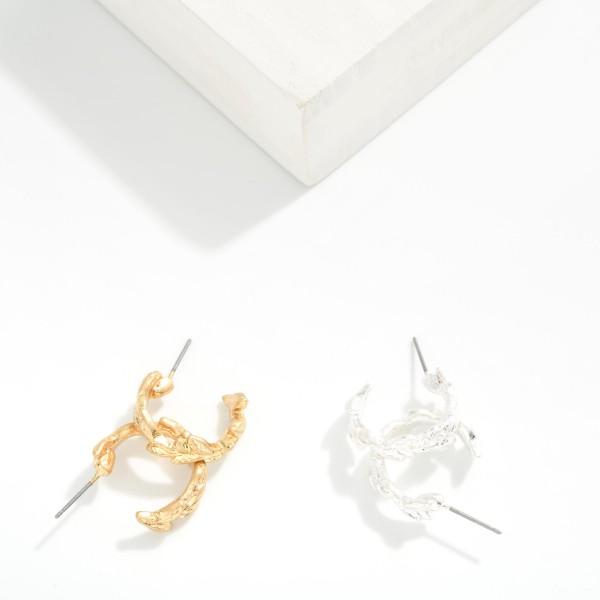Metal Tone Leaf Hoop Earrings 

- Approximately .75" D