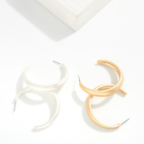 Hammered Metal Hoops With Raised Edges

- Approximately 1.5" D