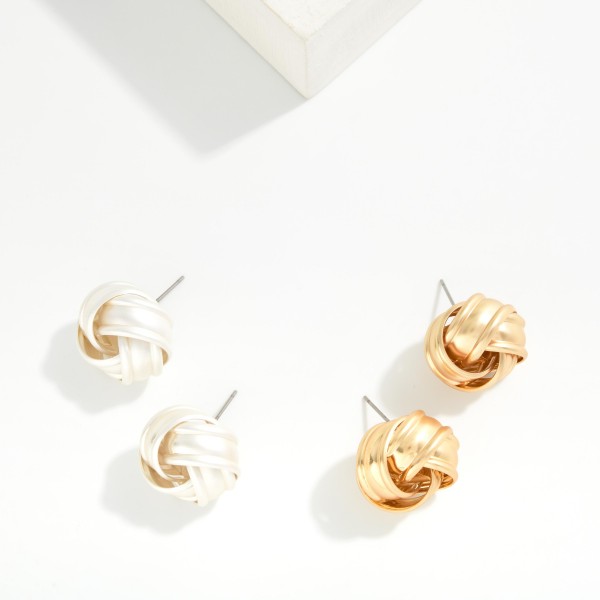 Large Metal Tone Stud Earrings With Raised Border 

- Approximately .75" L