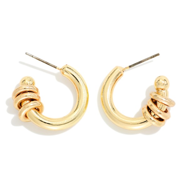 Metal Tone Hoop Earrings With Triple Ring Detail

- Approximately .75" D