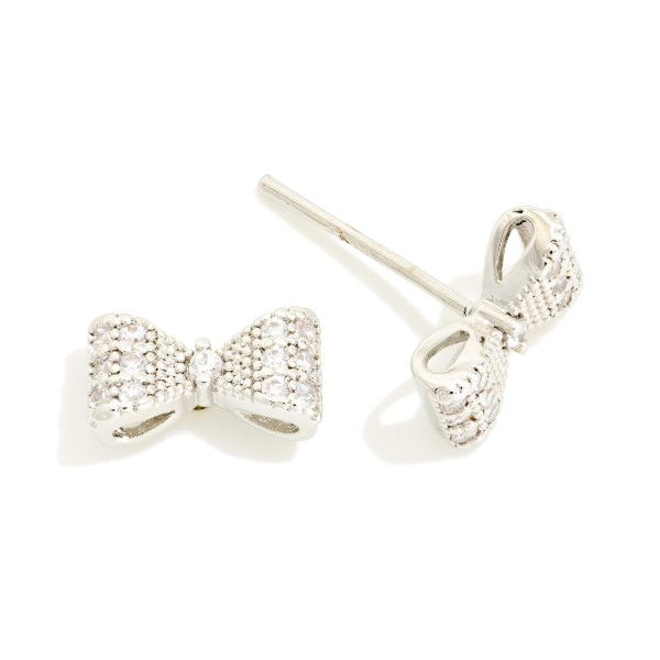 Cubic Zirconia Bow Stud Earrings 

- Gold Dipped
- Approximately .15" L
