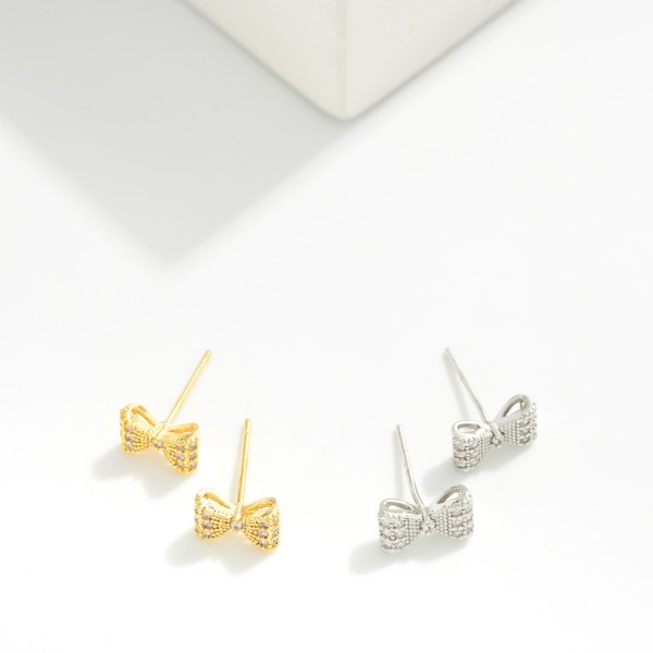 Cubic Zirconia Bow Stud Earrings 

- Gold Dipped
- Approximately .15" L
