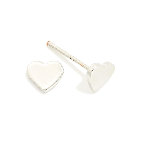 Metal Tone Heart Stud Earrings 

- Gold Dipped 
- Approximately .15" L