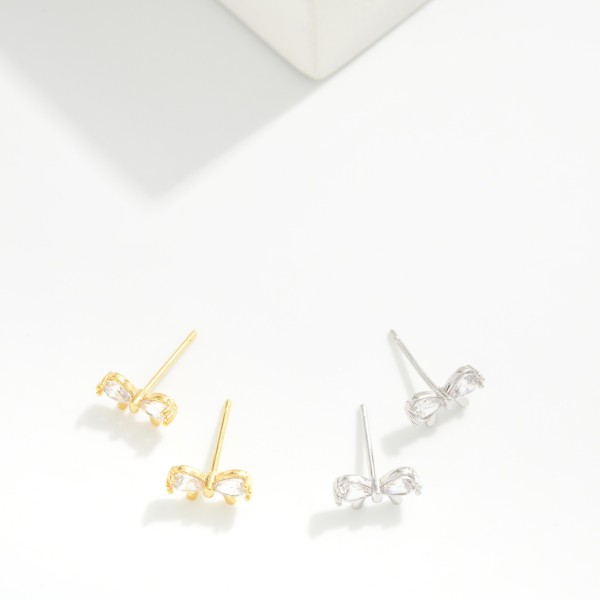 Cubic Zirconia Bow Stud Earrings 

- Gold Dipped
- Approximately .15" L
