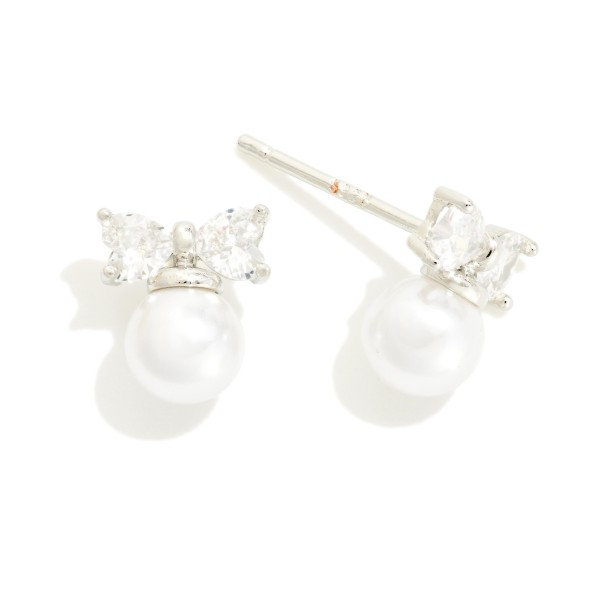 Cubic Zirconia Bow & Pearl Stud Earrings 

- Gold Dipped
- Approximately .25" L
