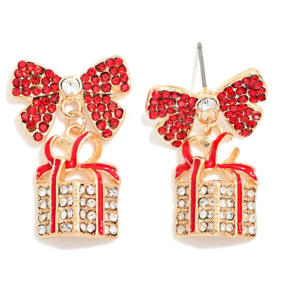 Rhinestone Bow Gift Box Drop Earrings featuring a fully pave rhinestone bow post with a sparkling crystal center, dangling a glittering present wrapped in rhinestones and enamel ribbon. Every surface catches the light, making these a true showstopper for holiday events. Perfect for Christmas parties, New Year's Eve, and festive date nights. Sparkle sells in December, and bow inspired designs are one of the strongest trends of the season.